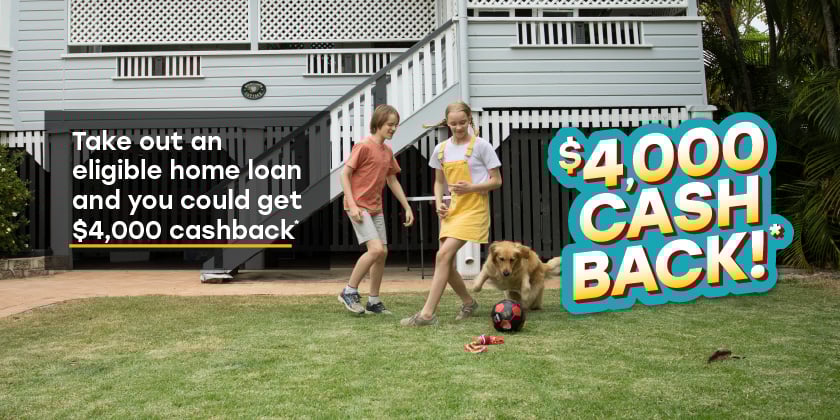 Promotional image featuring two children playing with a dog in a house yard. Text on the left promotes a home loan offer with '$4,000 cashback,' while the right side highlights '$4,000 CASH BACK!' in bold graphics.