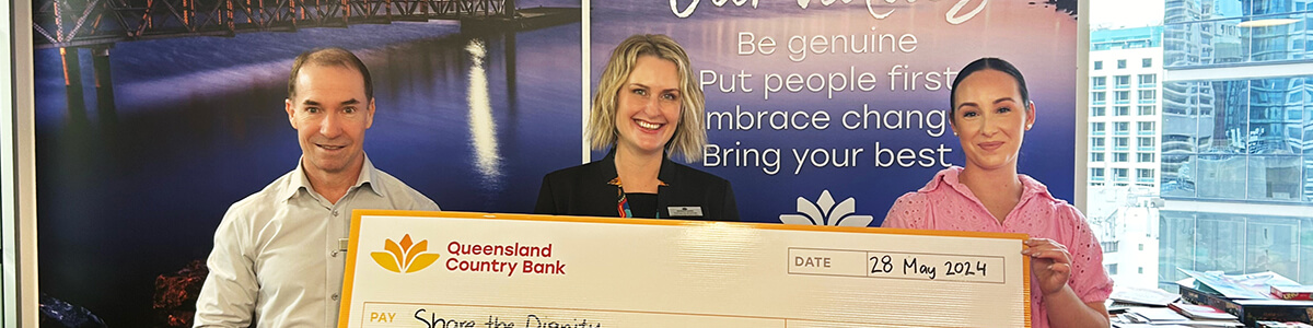 Workplace Giving Program - Queensland Country presenting a donation to Share the Dignity